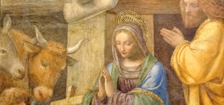 A nativity scene showing Mary and Joseph gazing lovingly at the baby Jesus