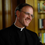 Portrait of Fr. Timothy Gallagher Smiling