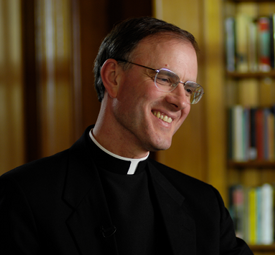 Portrait of Fr. Timothy Gallagher Smiling