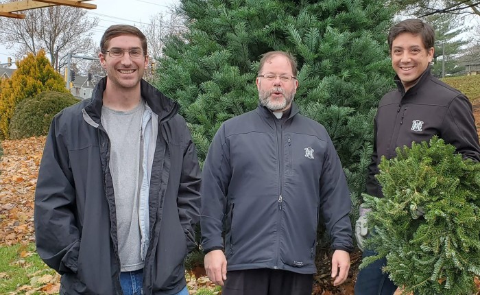 Br. Leland selecting a tree for St. Mary's in Alton, IL, with Fr. Jeremy Paulin and Fr. Paul Nguyen.