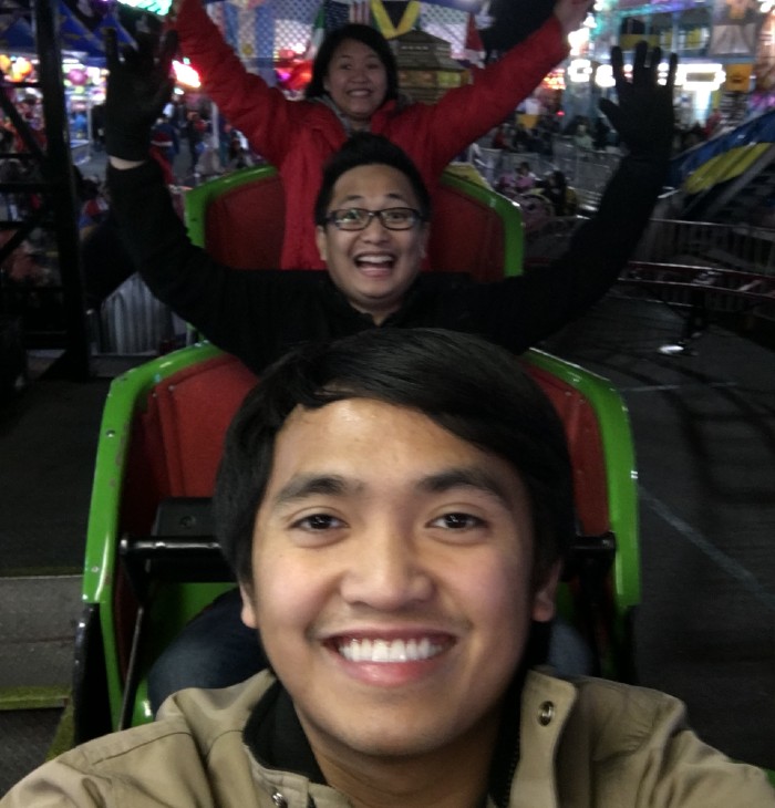 Miggo and his siblings on a roller coaster