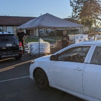 Oblates distributing relief supplies in the aftermath of Hurricane Ian