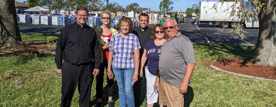 Oblates and parish volunteers posing for a photo at San Pedro