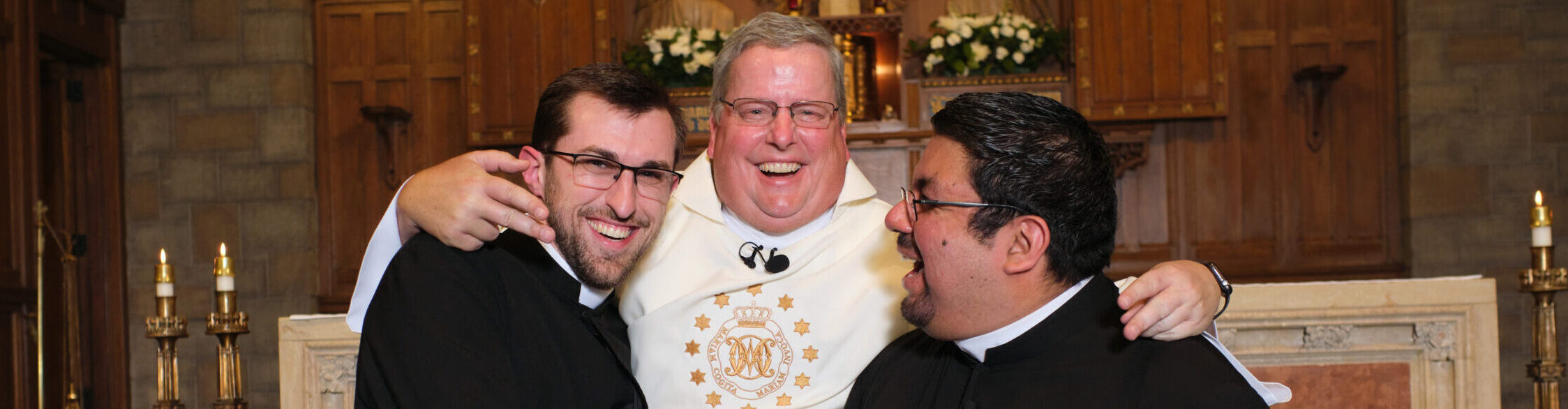 Father Jonathon Hank, Father Jim Walther, and Father Jorge Sanchez